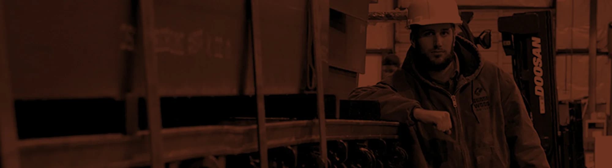 Warehouse worker in hard hat at TrailerDecking.com