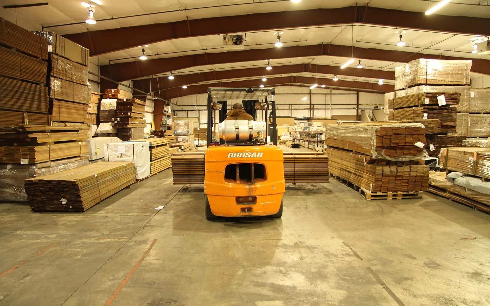 Apitong and trailer decking units stacked at the Nova USA warehouse
