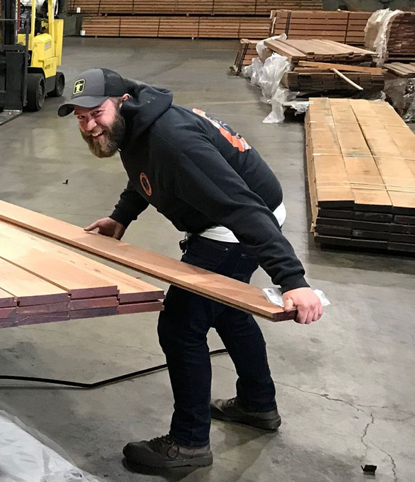 Kevin preparing a shipment of apitong shiplap trailer decking to keep a customer hauling